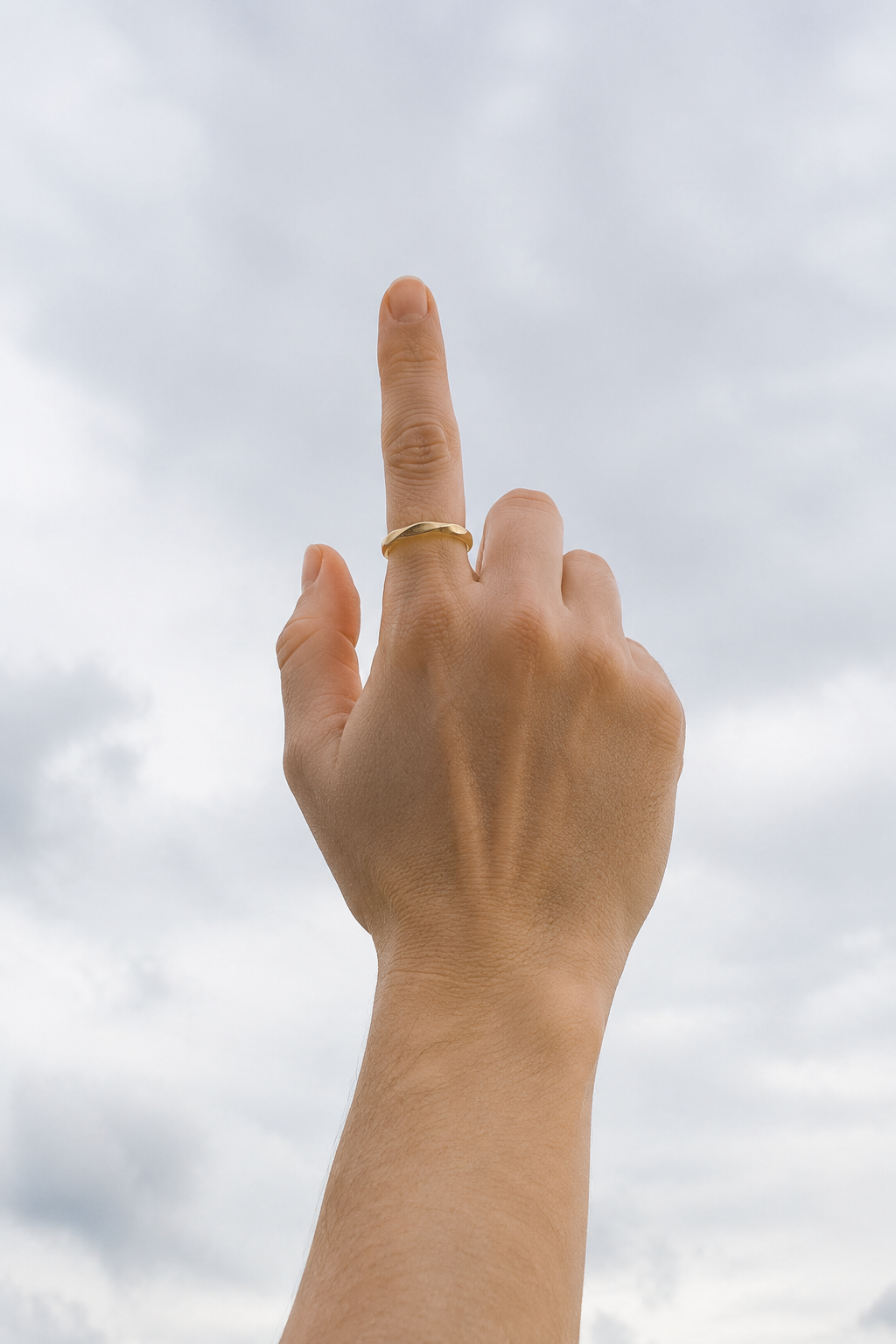 VEER Gold ring worn outdoors on a feminine hand